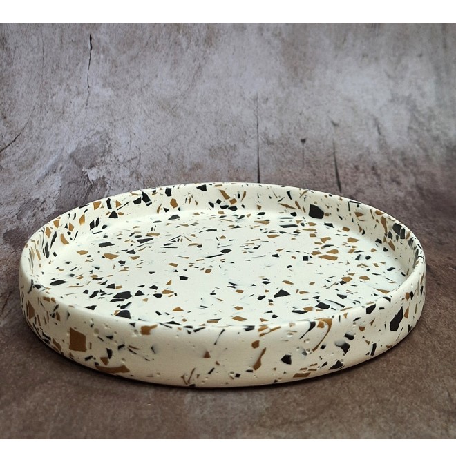 Bandeja redonda Terrazzo negro/ochre en blanco