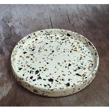 Bandeja redonda Terrazzo negro/ochre en blanco
